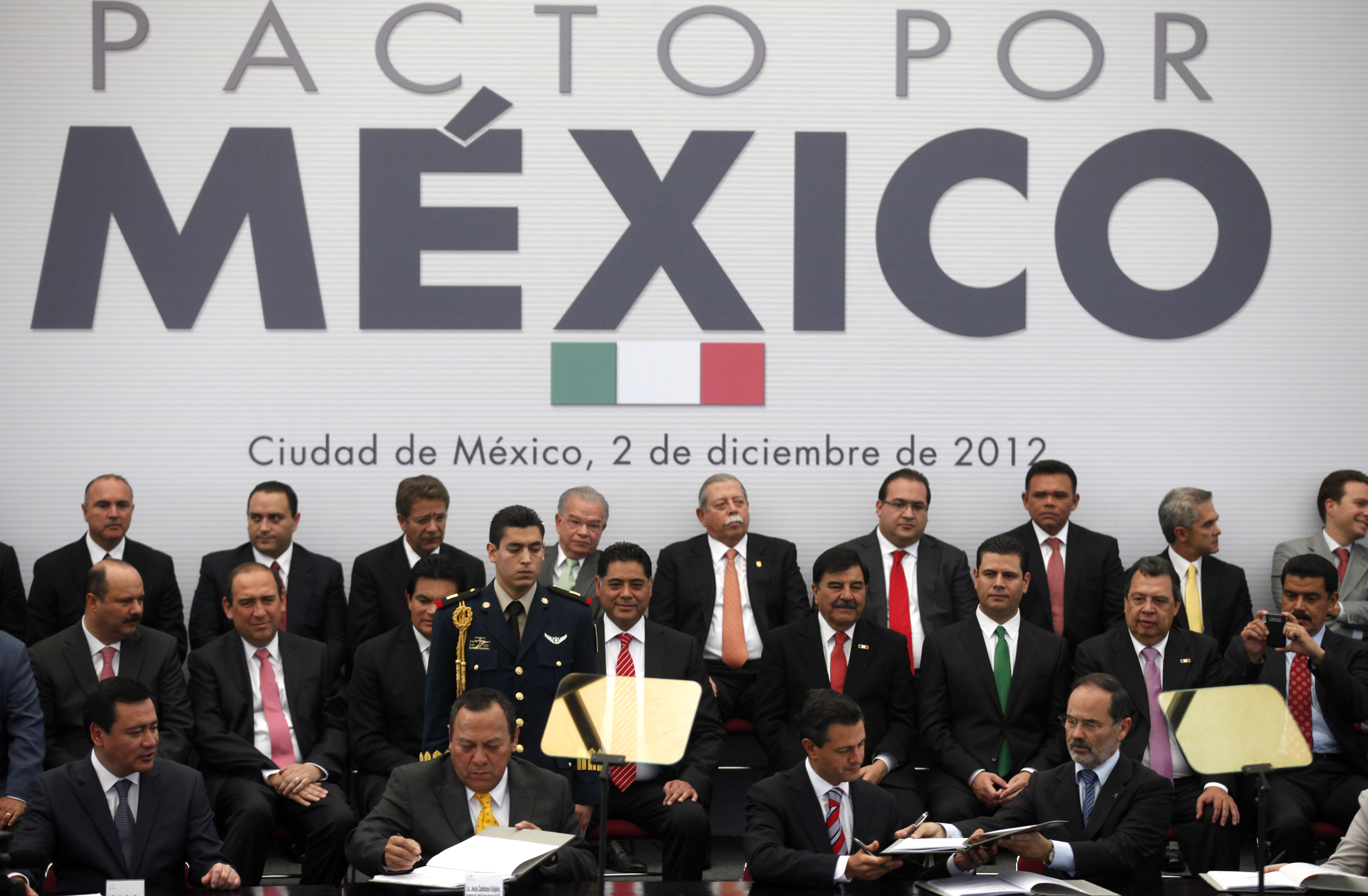 Mexico's President Pena Nieto, Chairman of the PRD Zambrano and Chairman of the PAN Madero sign a pact in Mexico City